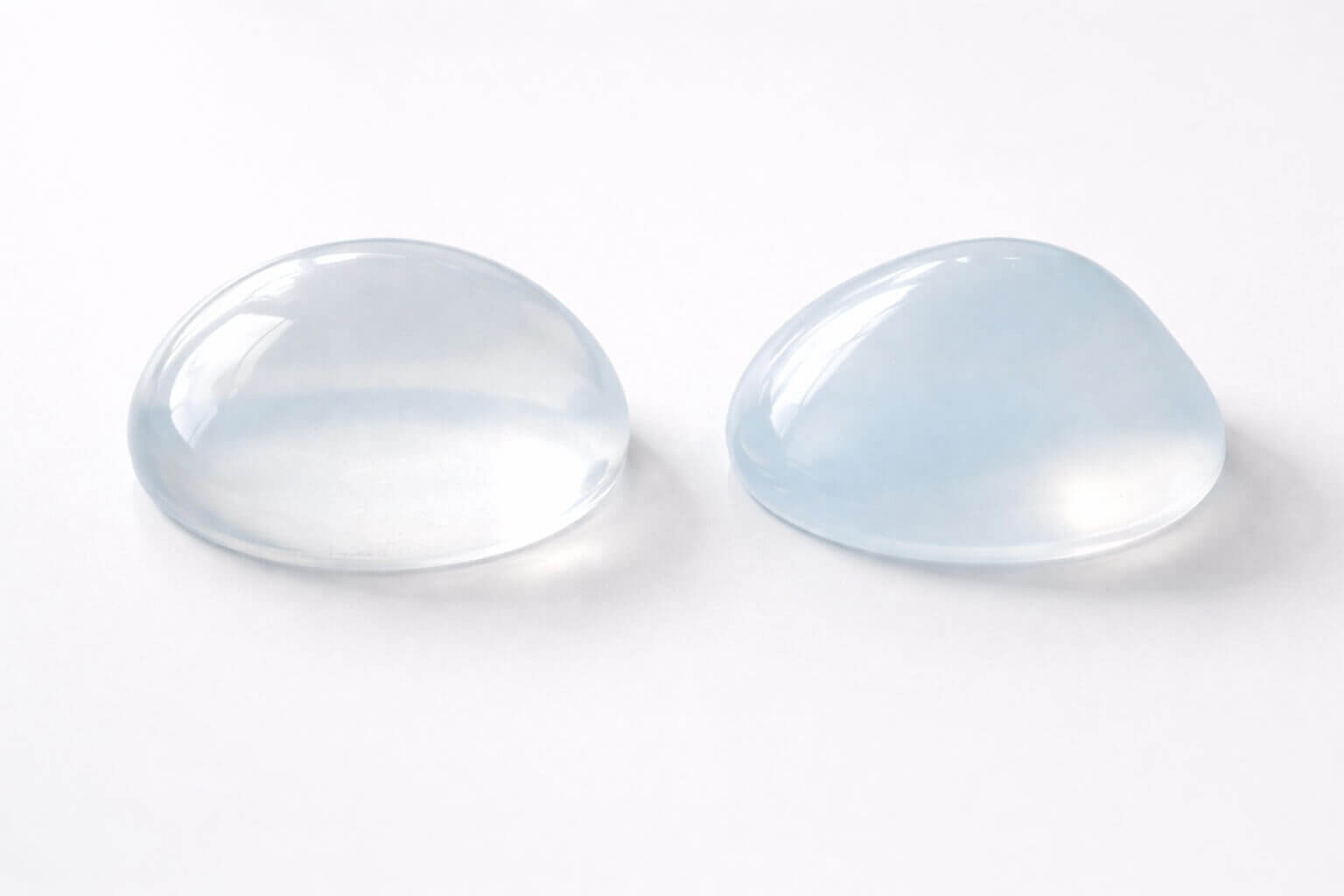Saline breast implant and silicone cohesive gel breast implant side by side comparison